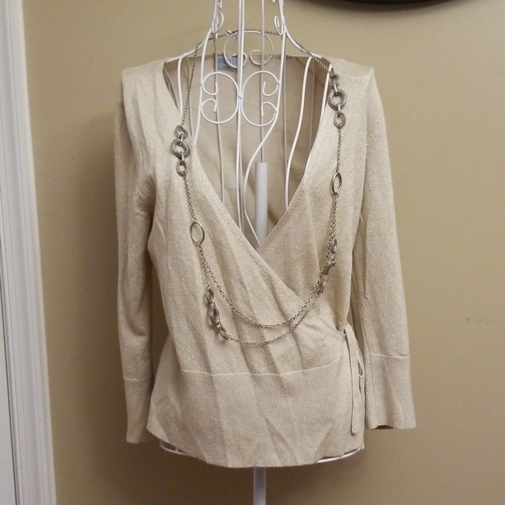 Golden wrap sweater with necklace